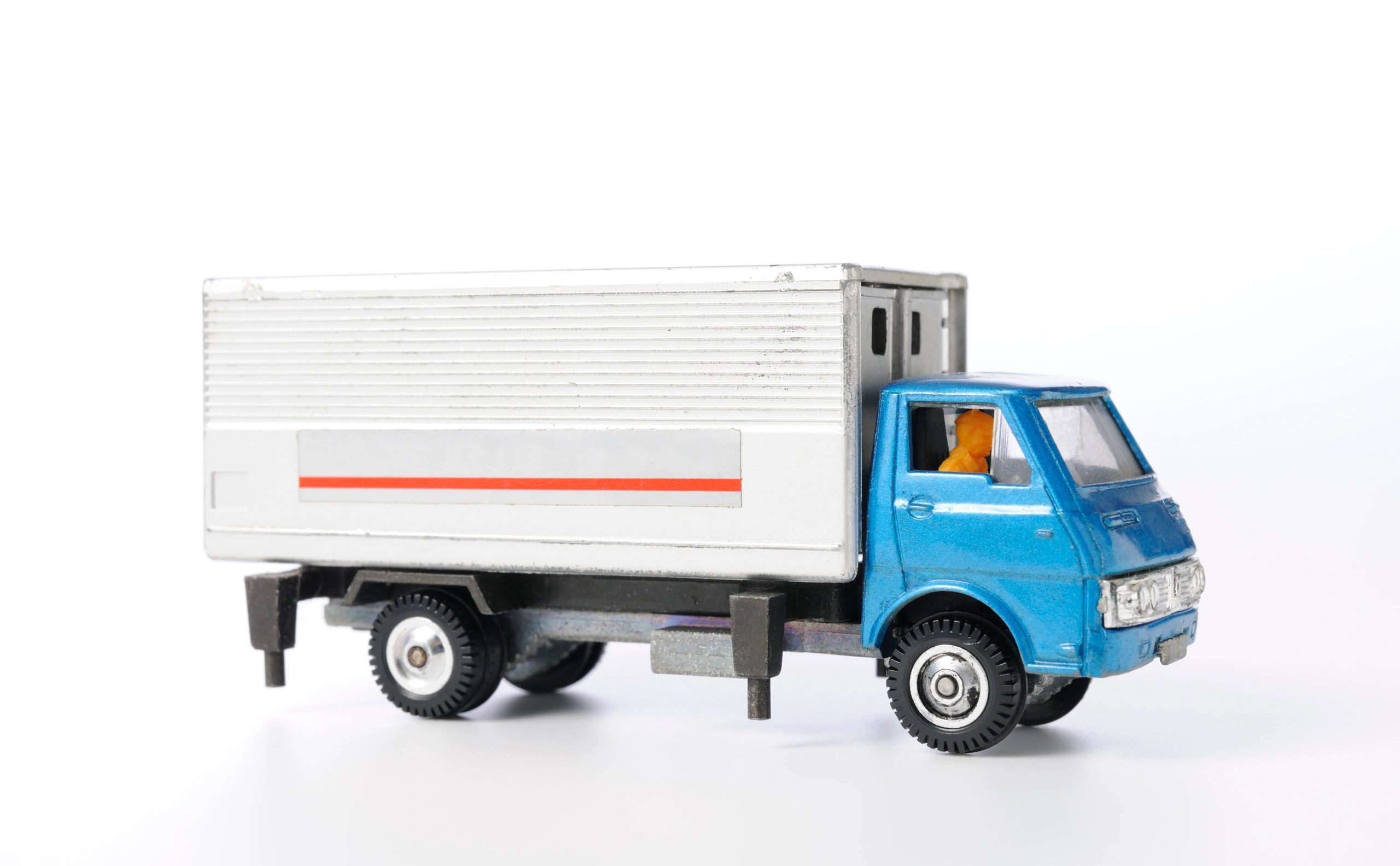 Vintage toy truck model on a white background