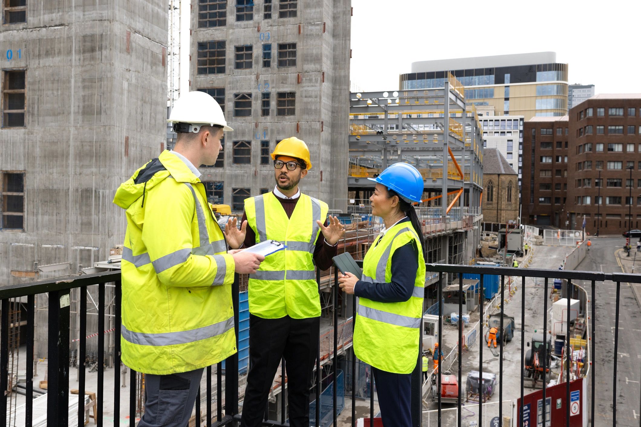 Construction team reviewing plans—service company audience