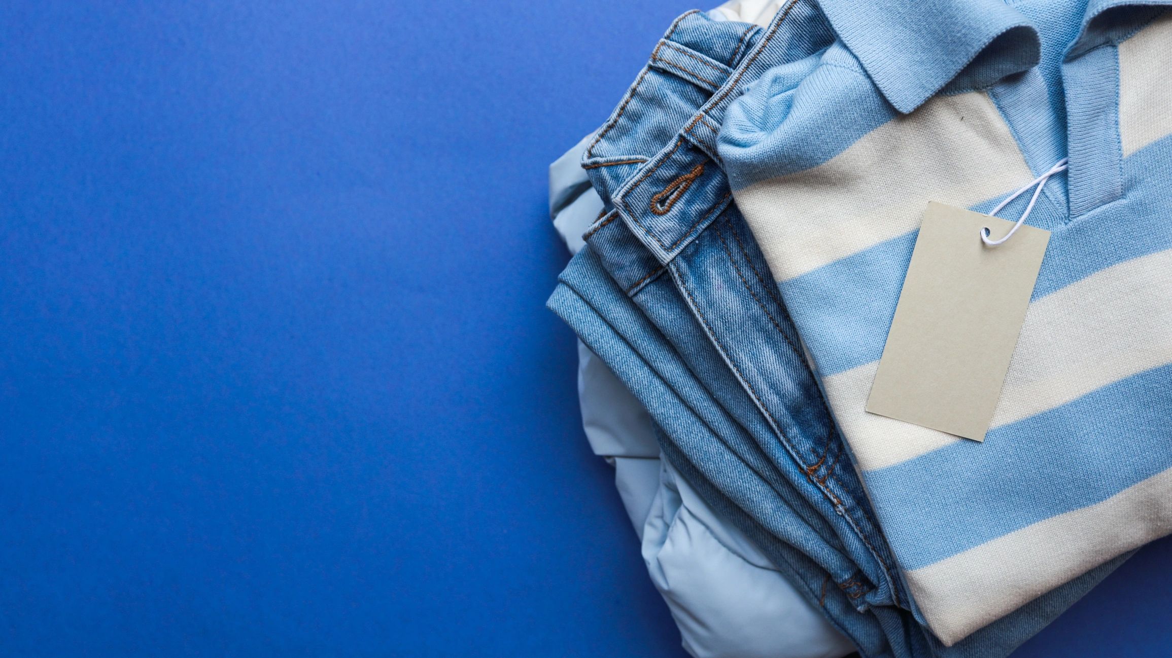 Folded apparel with a blank tag ready for branding