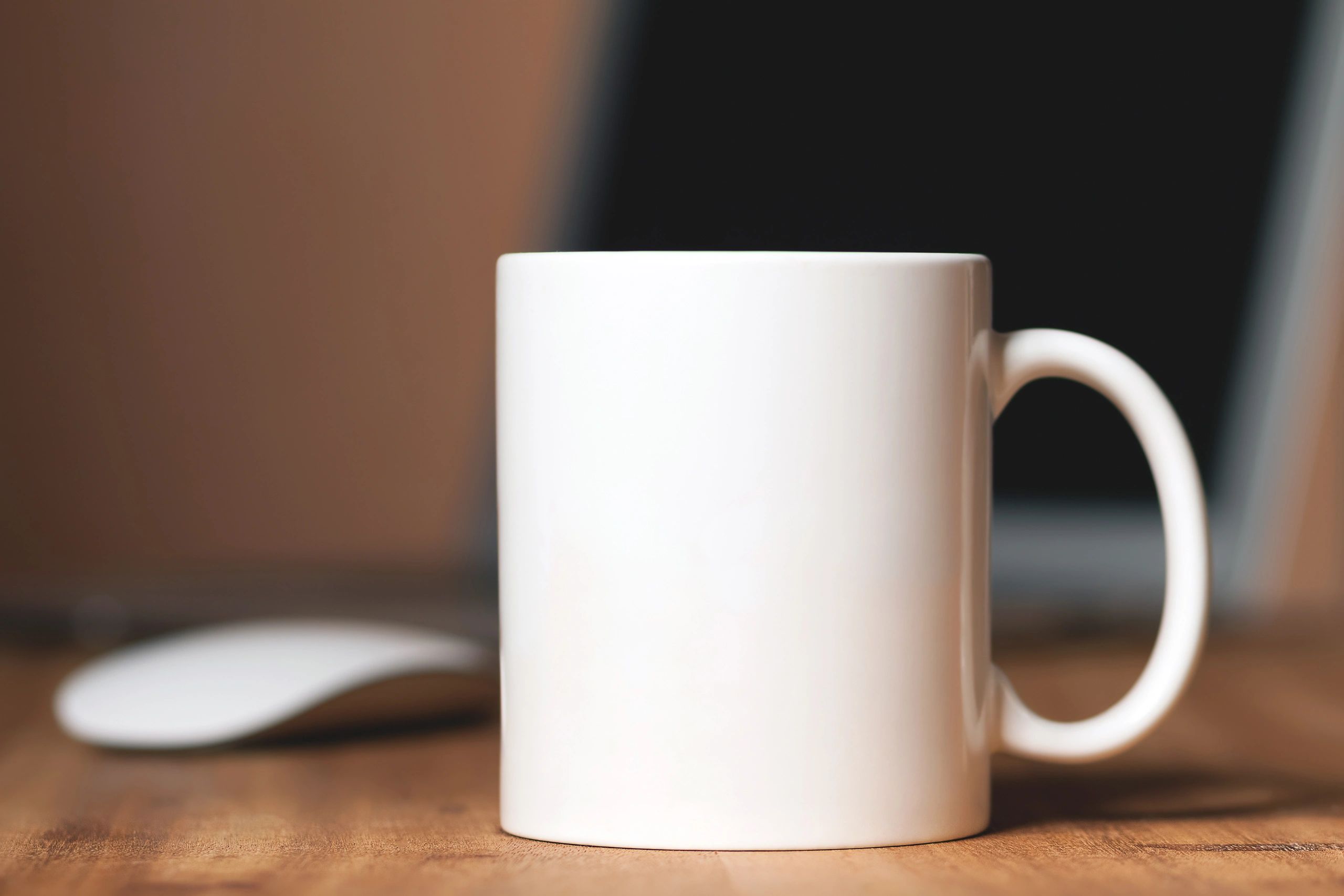 White mug on a wooden table