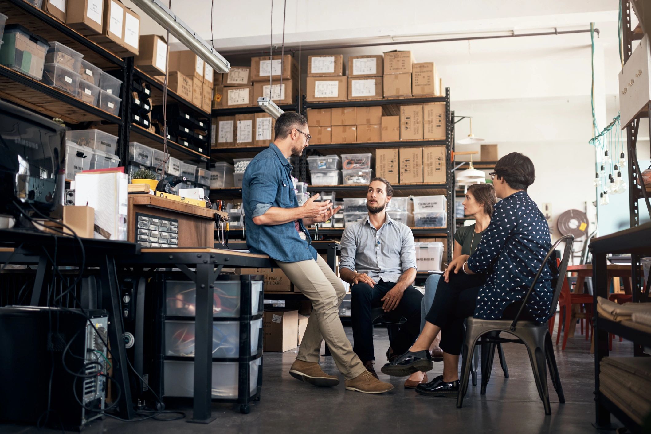 Team discussing work in a workshop